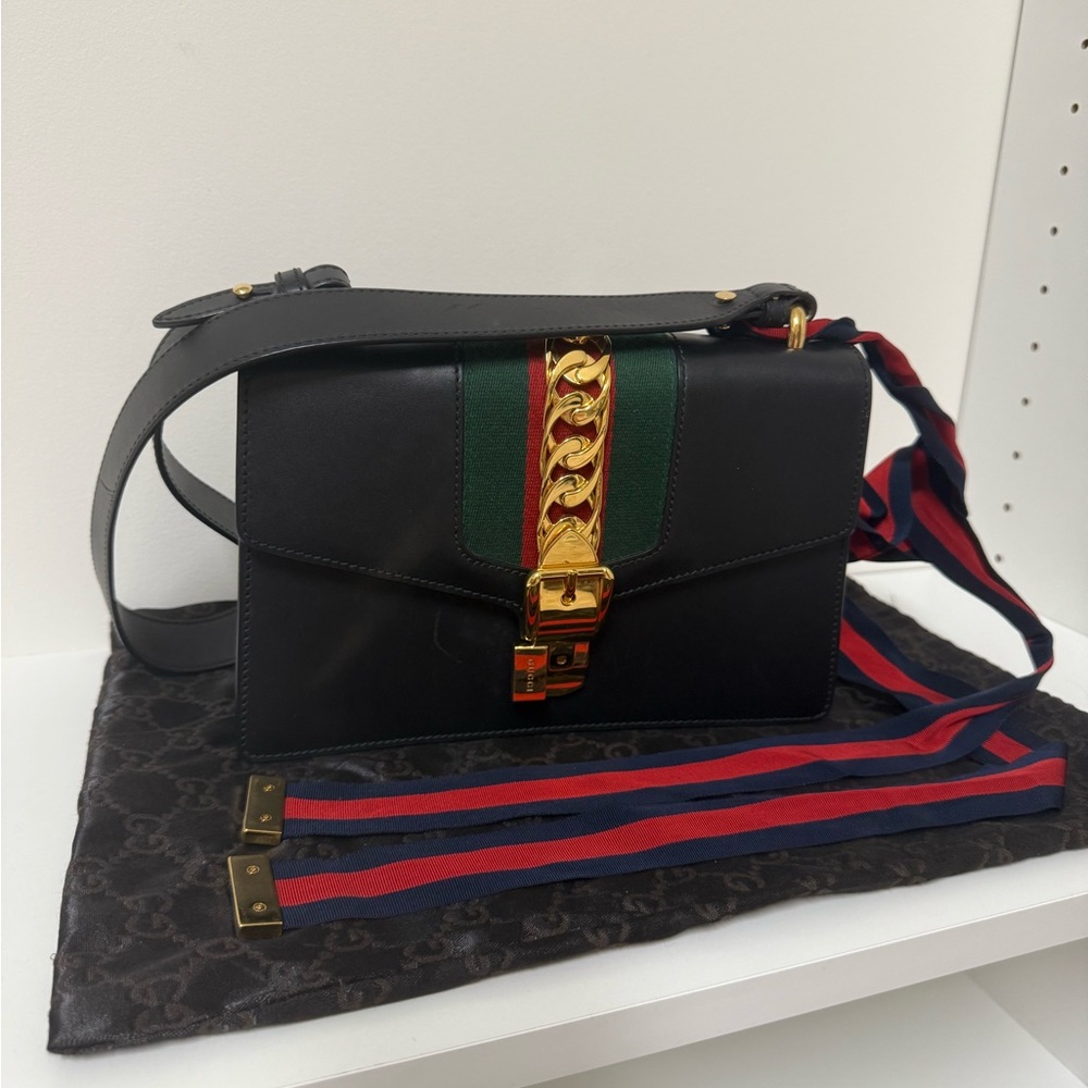 Gucci Black and Gold Shoulder Bag with Luxurious Chain Detail